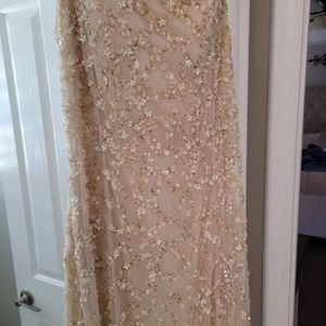 Women's cream colored formal strapless dress